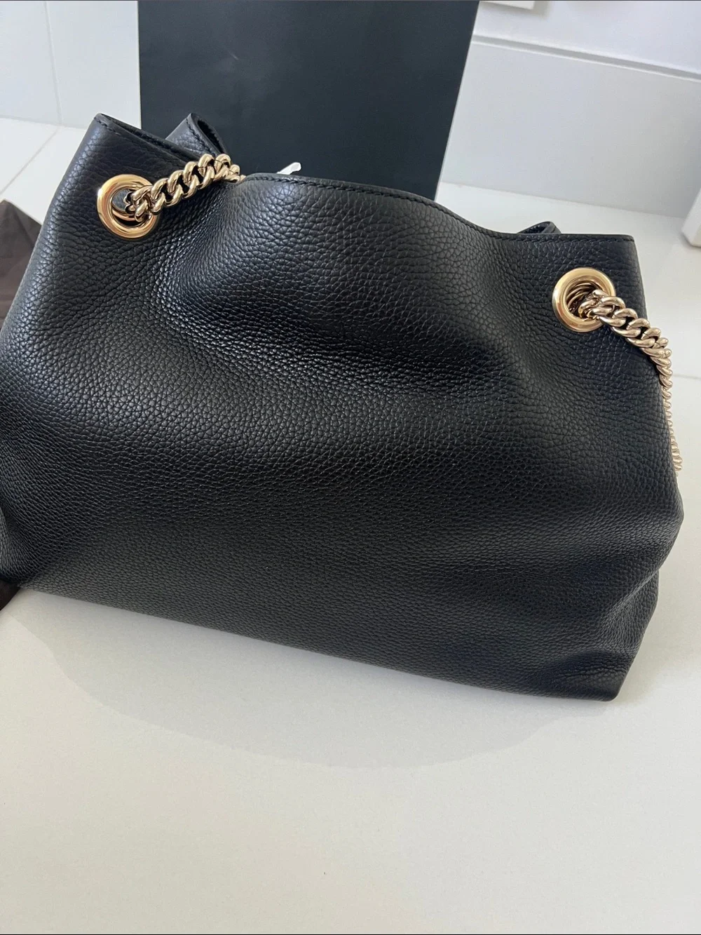 Gucci interlocking GG Black Soho Leather Shoulder Bag with Gold Chain and Tassel